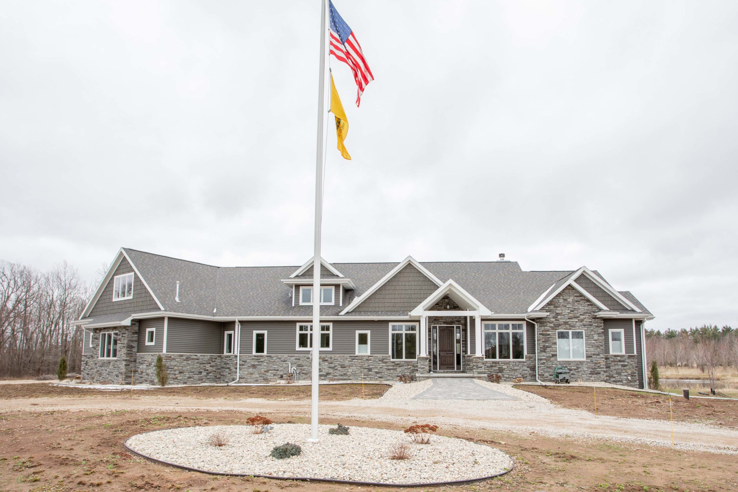Front exterior view of The Sundust custom home in Green Bay, WI. built by LeMense Quality Homes, Inc.